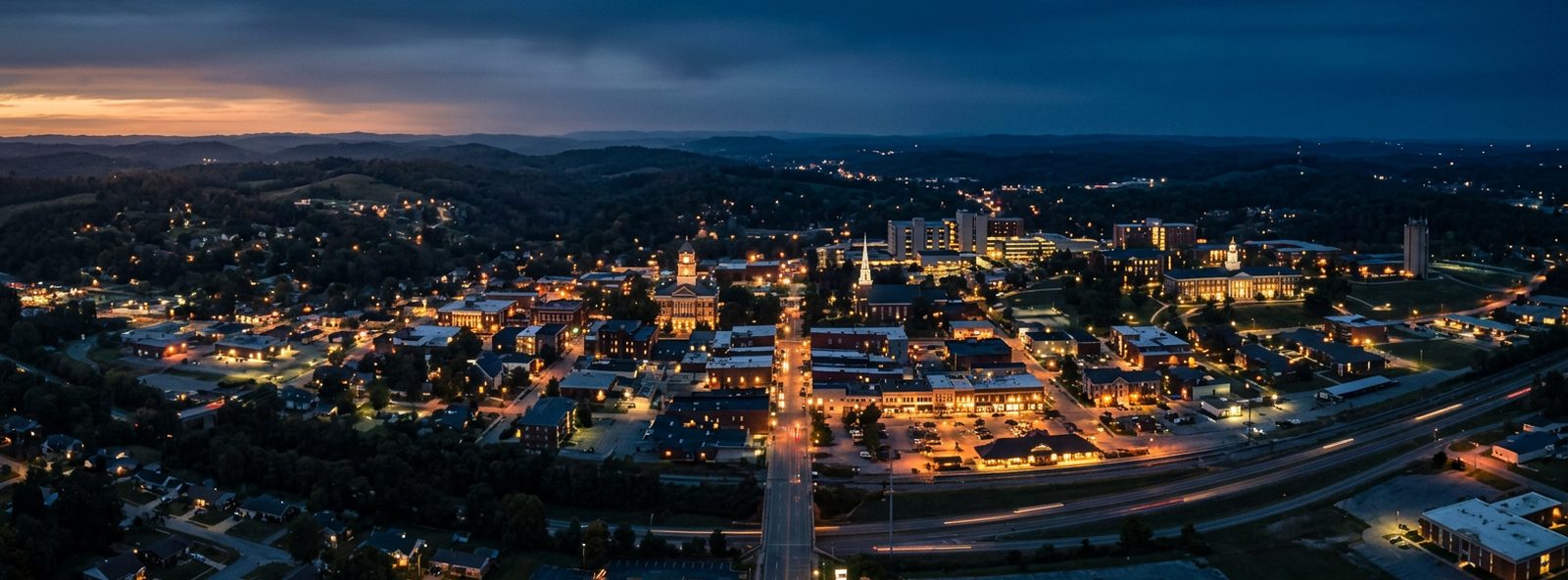 Aerial view of the Cookeville, Tennessee skyline at dusk, illustrating the metro area TactStack serves trade and service businesses in