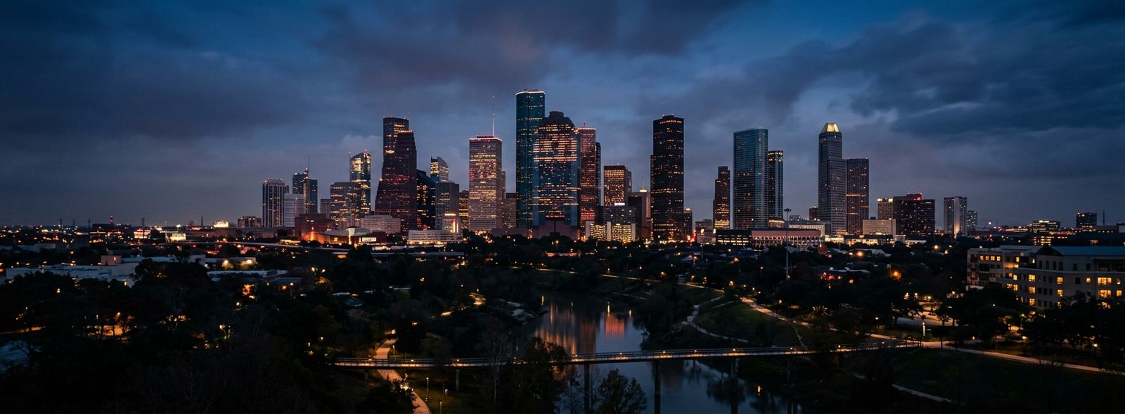 Aerial view of the Houston, Texas skyline at dusk, illustrating the metro area TactStack serves trade and service businesses in