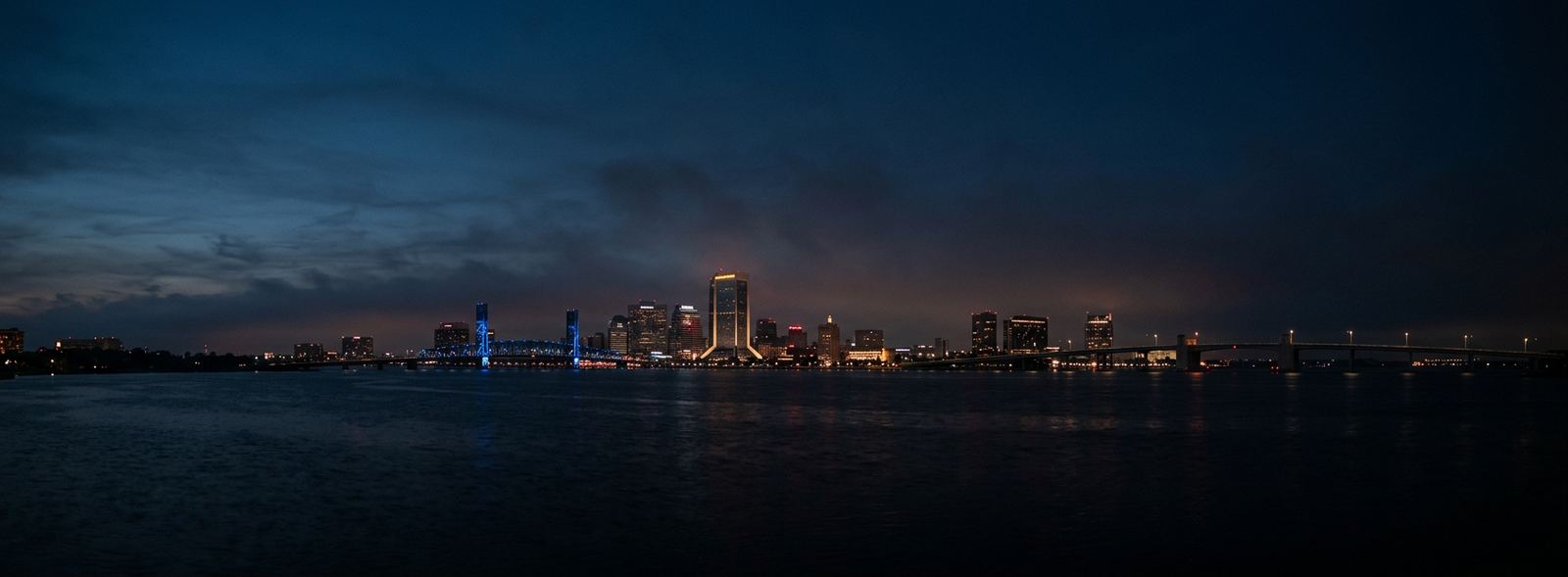Aerial view of the Jacksonville, Florida skyline at dusk, illustrating the metro area TactStack serves trade and service businesses in