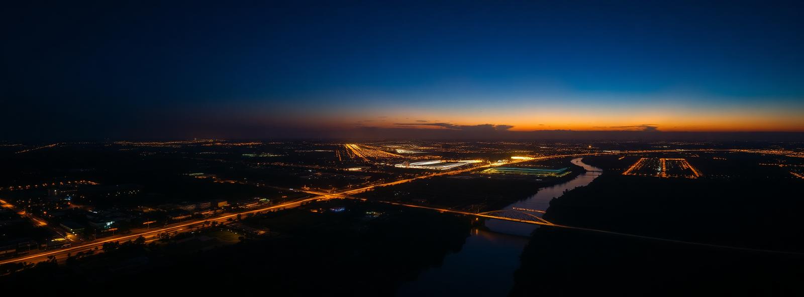 Aerial view of the Lafayette, Louisiana skyline at dusk, illustrating the metro area TactStack serves trade and service businesses in