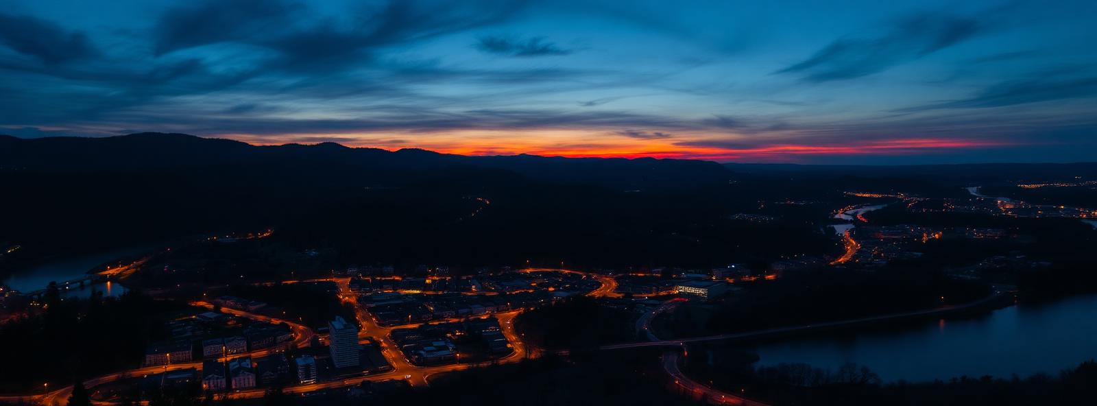 Aerial view of the Lynchburg, Virginia skyline at dusk, illustrating the metro area TactStack serves trade and service businesses in