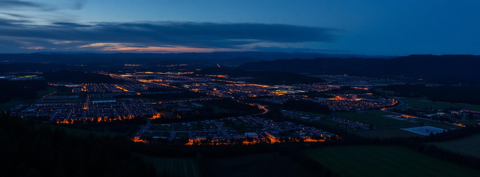 Aerial view of the Medford, Oregon skyline at dusk, illustrating the metro area TactStack serves trade and service businesses in