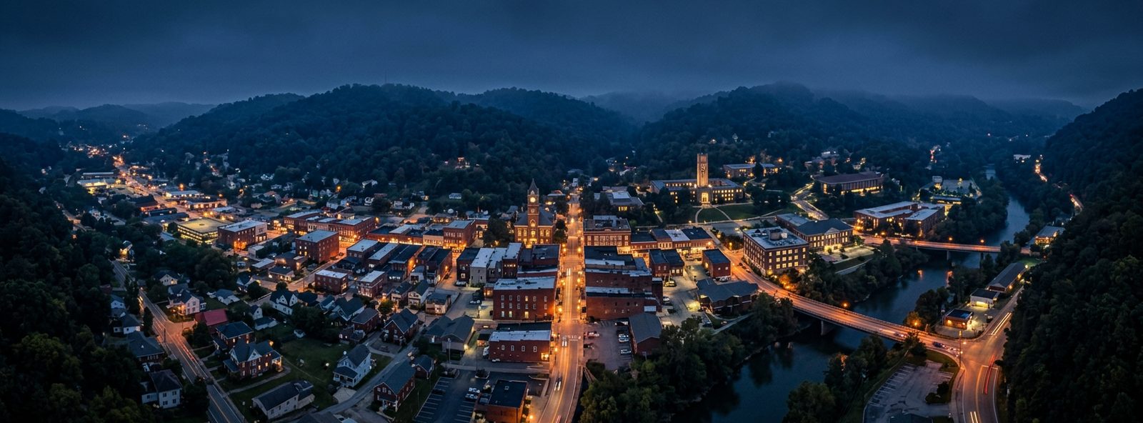 Aerial view of the Morehead, Kentucky skyline at dusk, illustrating the metro area TactStack serves trade and service businesses in