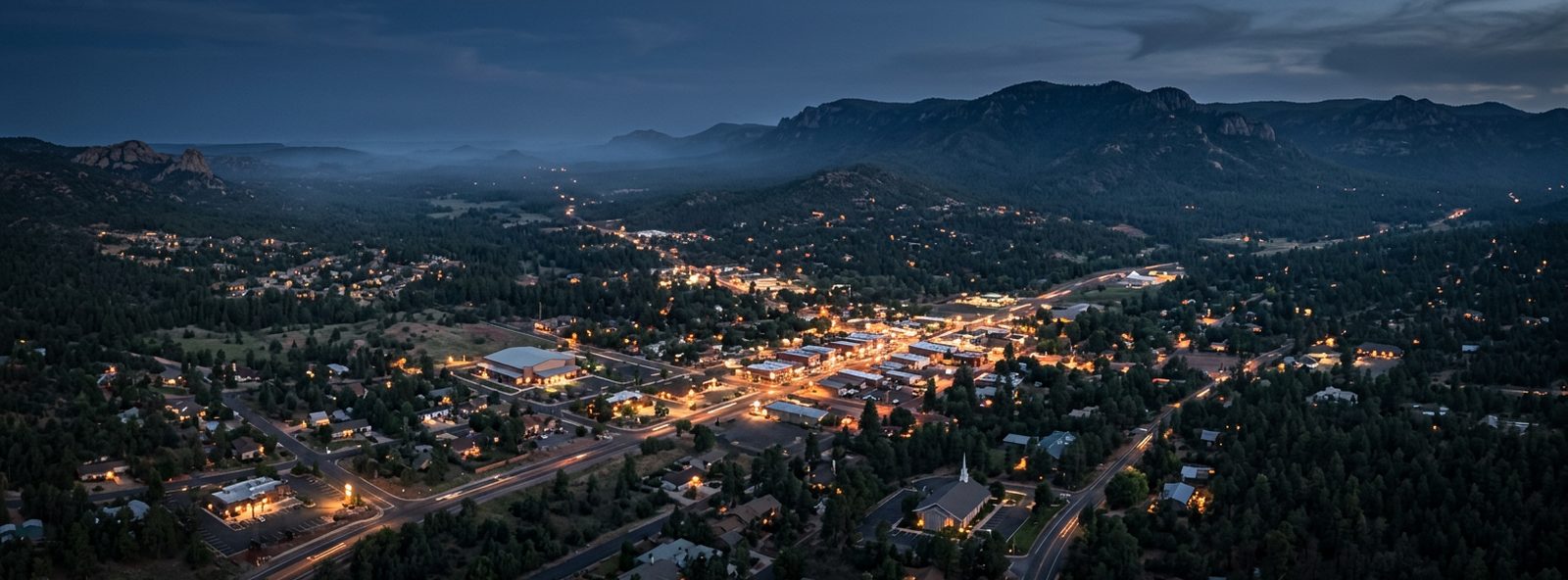 Aerial view of the Payson, Arizona skyline at dusk, illustrating the metro area TactStack serves trade and service businesses in