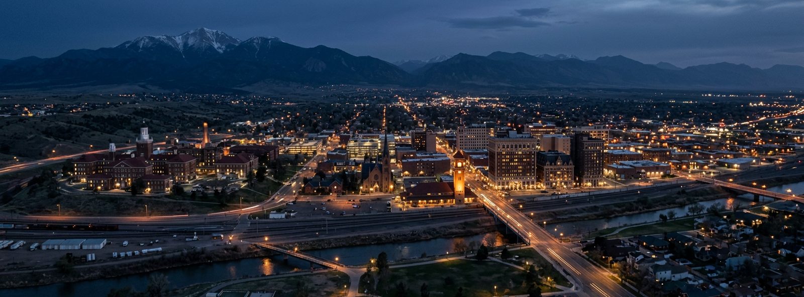 Aerial view of the Pueblo, Colorado skyline at dusk, illustrating the metro area TactStack serves trade and service businesses in