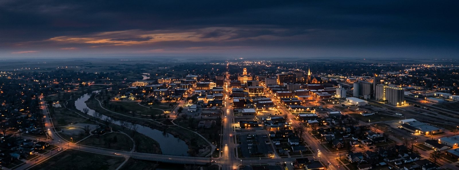 Aerial view of the Salina, Kansas skyline at dusk, illustrating the metro area TactStack serves trade and service businesses in