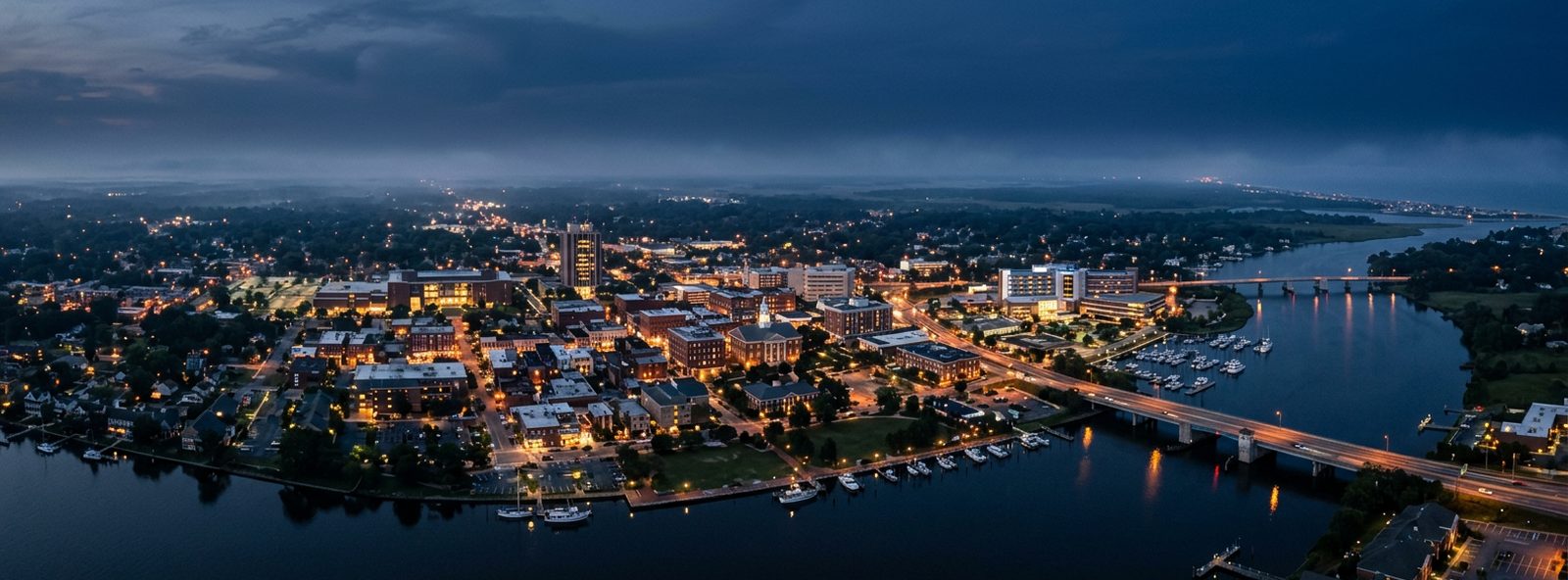 Aerial view of the Salisbury, Maryland skyline at dusk, illustrating the metro area TactStack serves trade and service businesses in