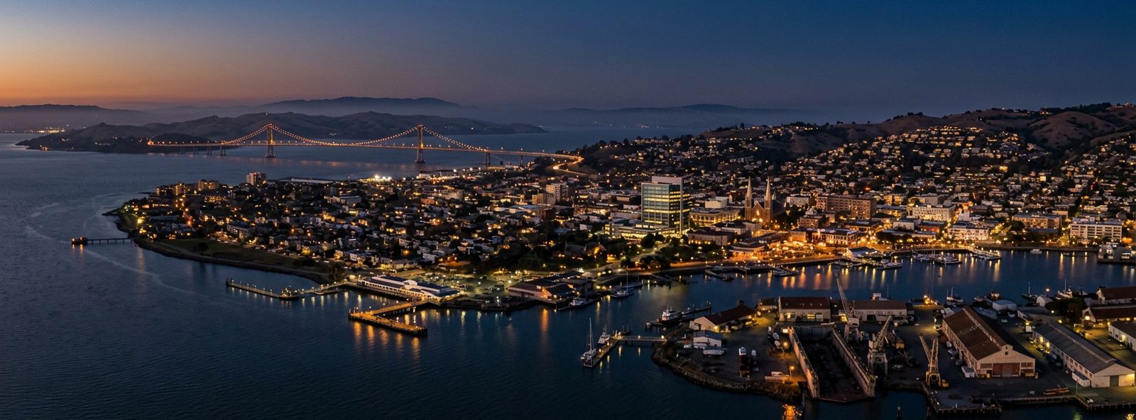 Aerial view of the Vallejo, California skyline at dusk, illustrating the metro area TactStack serves trade and service businesses in