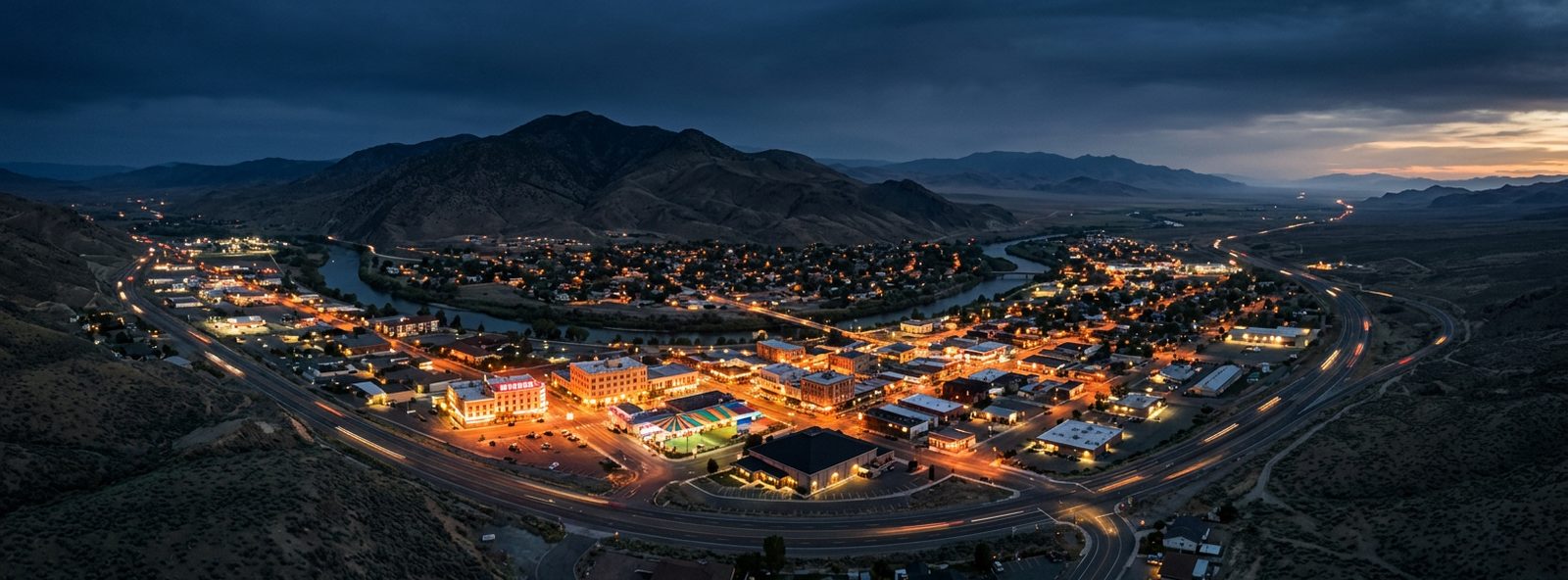 Aerial view of the Winnemucca, Nevada skyline at dusk, illustrating the metro area TactStack serves trade and service businesses in